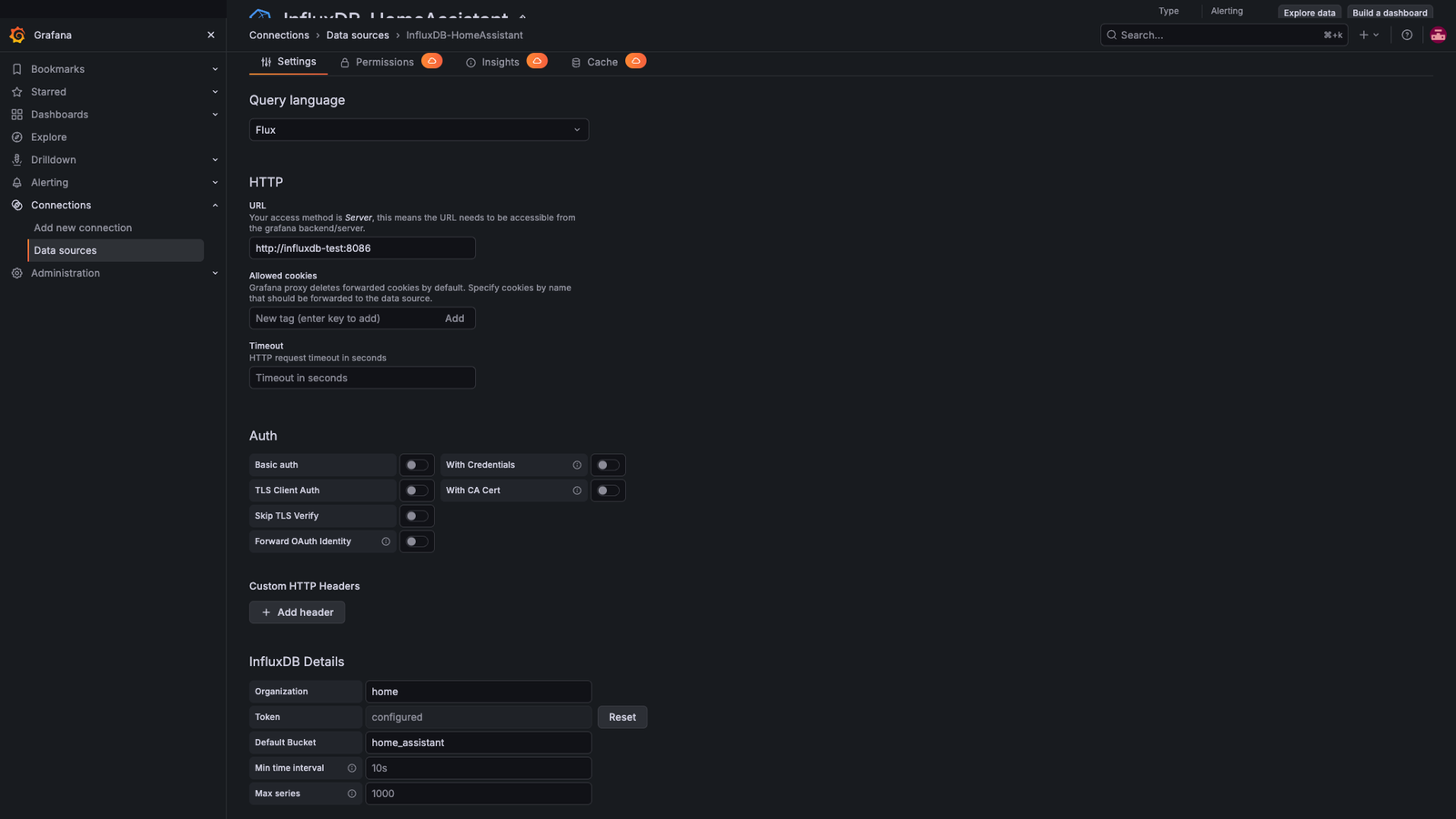 Grafana data source settings screen configured for InfluxDB 2 with Flux query language, organization, token and default bucket fields filled in